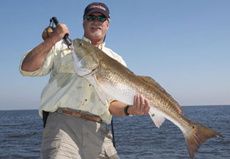 Captain Kirk Waltz Holding Up His Catch