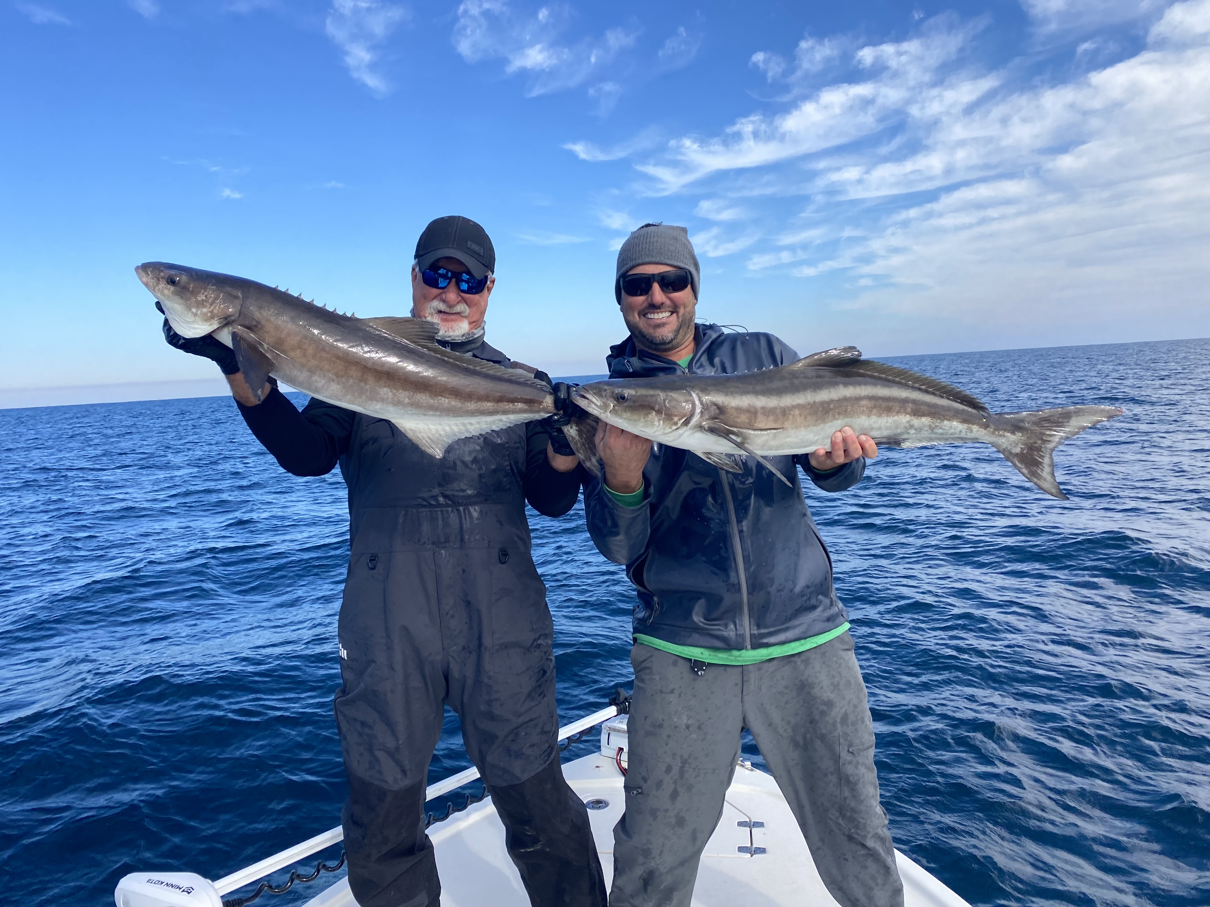 Man and Woman Posing with Catch